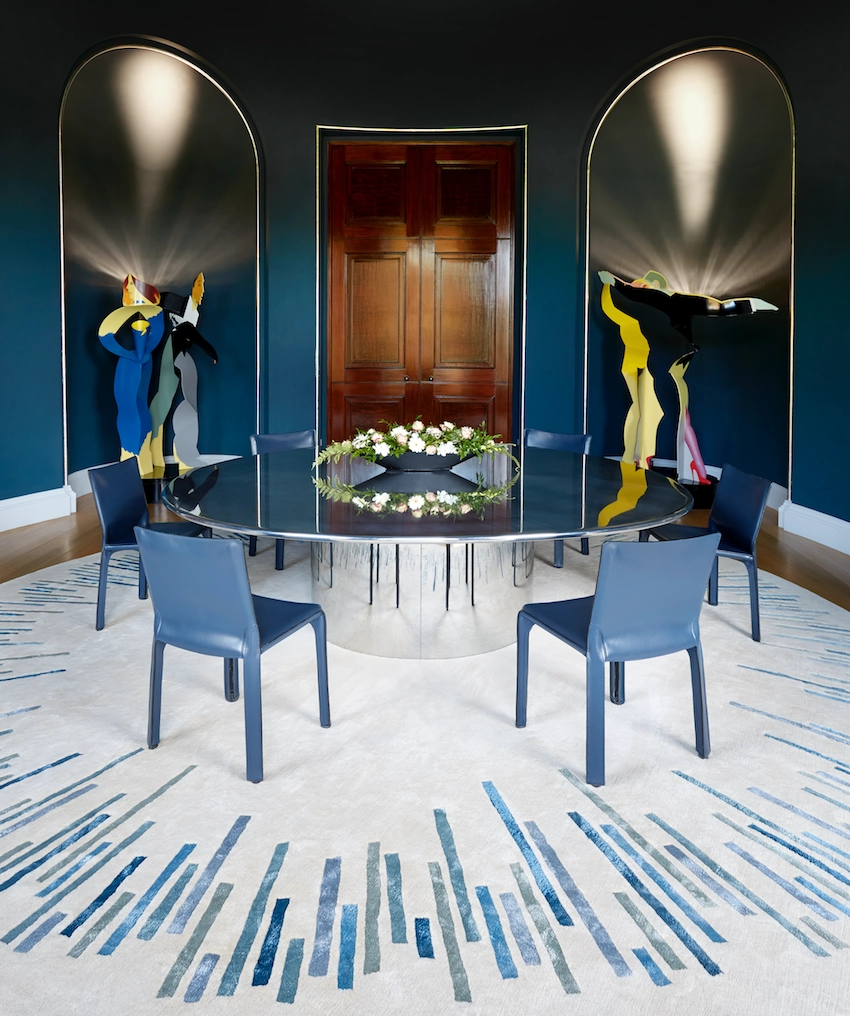 A custom round carpet created for the grand dining room of a listed property